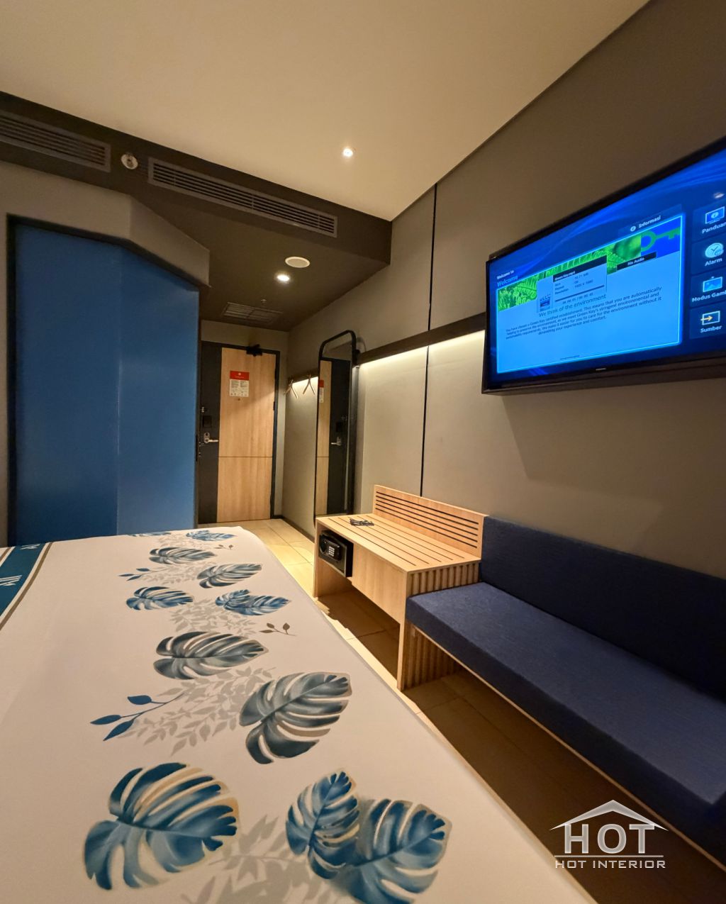 Design Interior Kamar Hotel Modern Minimalis dengan sentuhan Lighting industrial (urban compact) didesign oleh Hot Interior, dibuat oleh Hot Interior